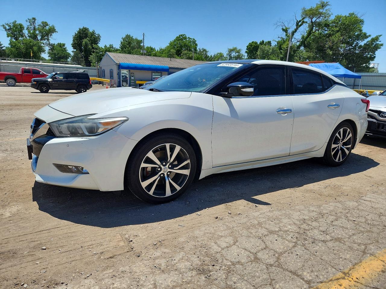 2016 Nissan Maxima SL, VIN 1N4AA6AP3GC380949 — Град