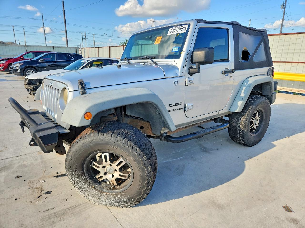 2012 Jeep Wrangler Sport, VIN 1C4GJWAG9CL143851 — Front end