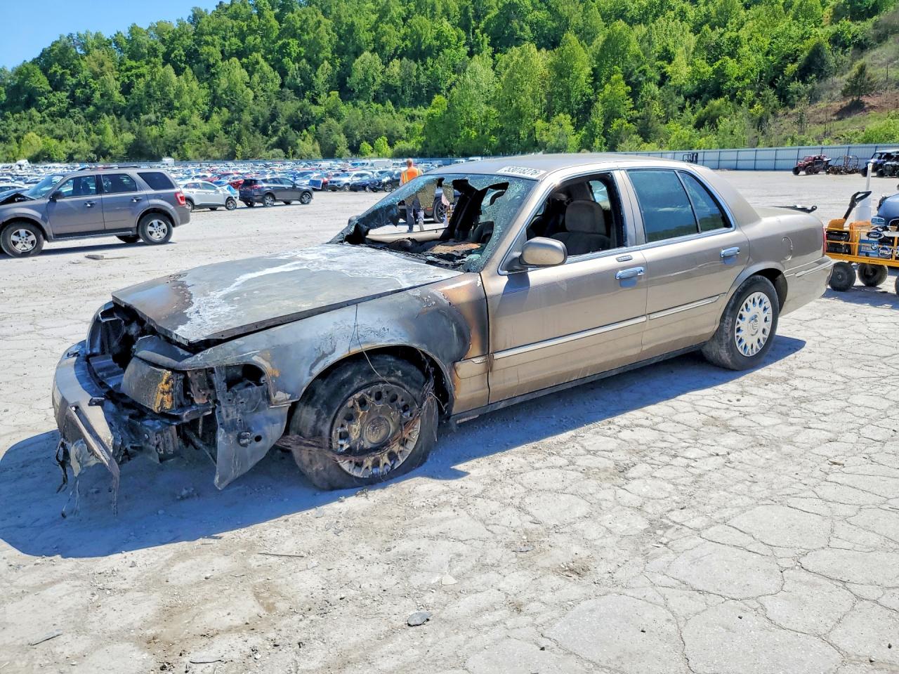 2003 Mercury Grand Marquis GS Convenience, VIN 2MEFM74WX3X701882 — Burn