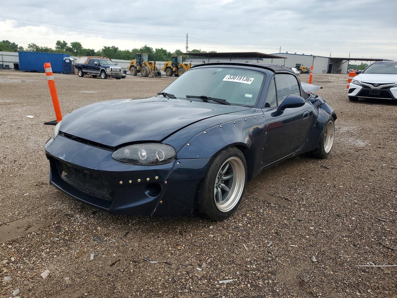 1999 Mazda MX-5 Miata, VIN JM1NB3531X0122039 — Rear end