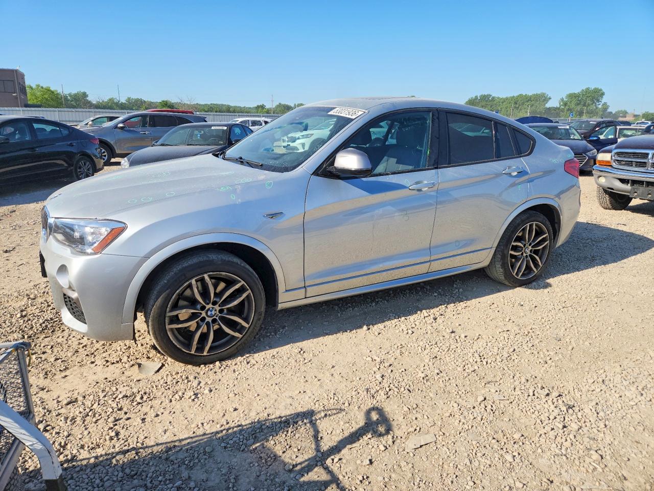 2017 BMW X4 M40i, VIN 5UXXW7C37H0W63684 — Hail