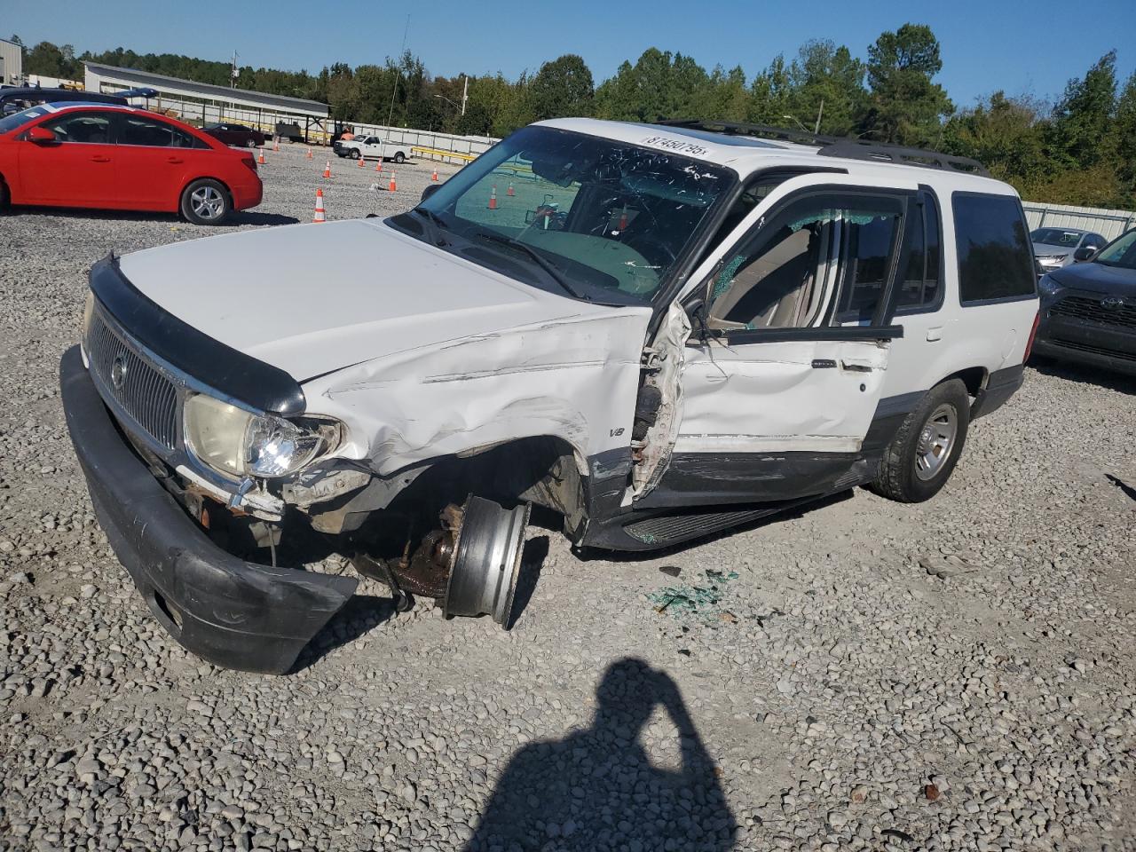 1999 Mercury Mountaineer, VIN 4M2ZU55P8XUJ39871 — Side