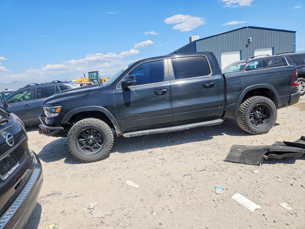 2024 Ram 1500 Rebel, VIN 1C6SRFLT8RN168662 — Side
