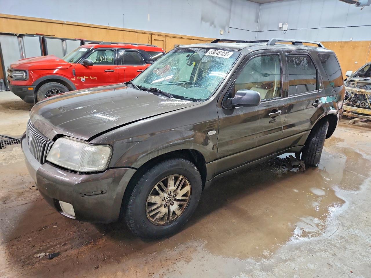 2006 Mercury Mariner Luxury, VIN 4M2YU57156DJ01694 — Rear end