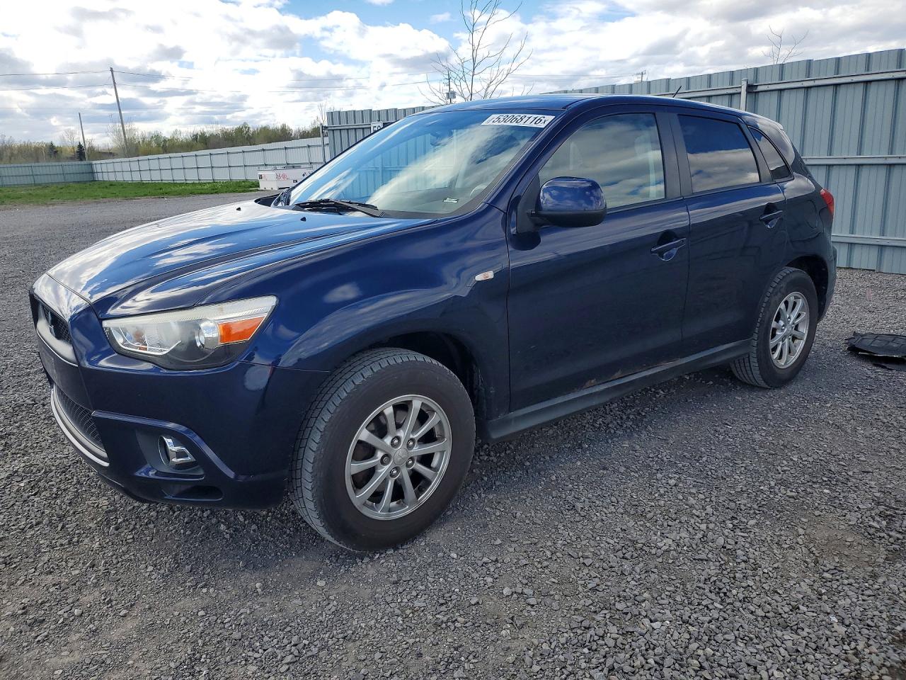 2011 Mitsubishi Outlander Sport ES, VIN JA4AH3AUXBZ604034 — Rear end