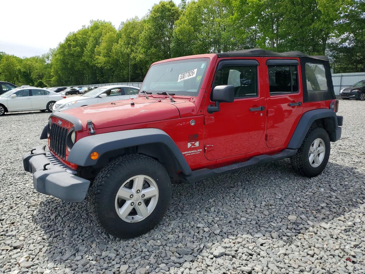2007 Jeep Wrangler Unlimited X, VIN 1J4GA39187L107227 — Burn