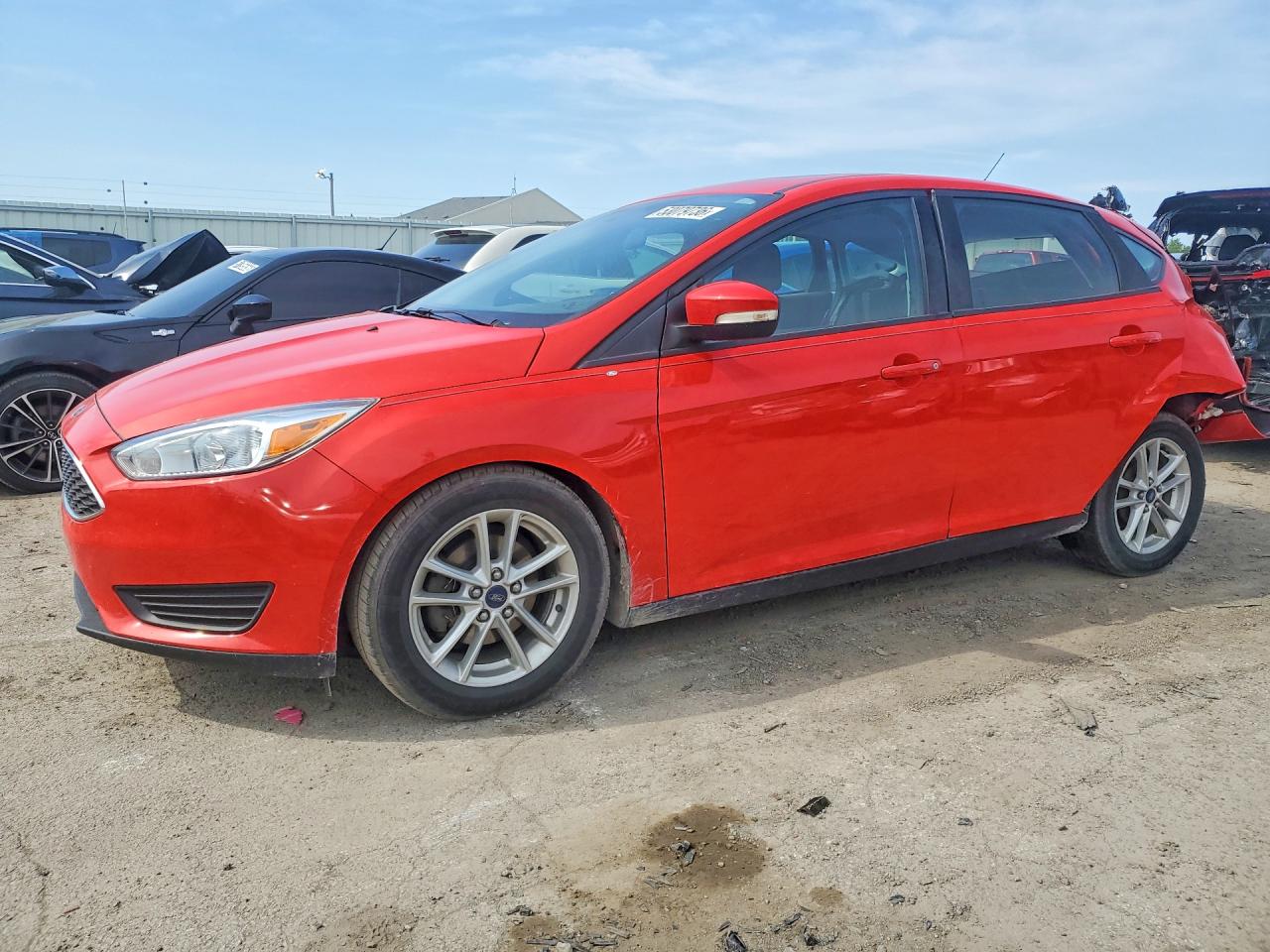 2016 Ford Focus SE, VIN 1FADP3K24GL242849 — Rear end