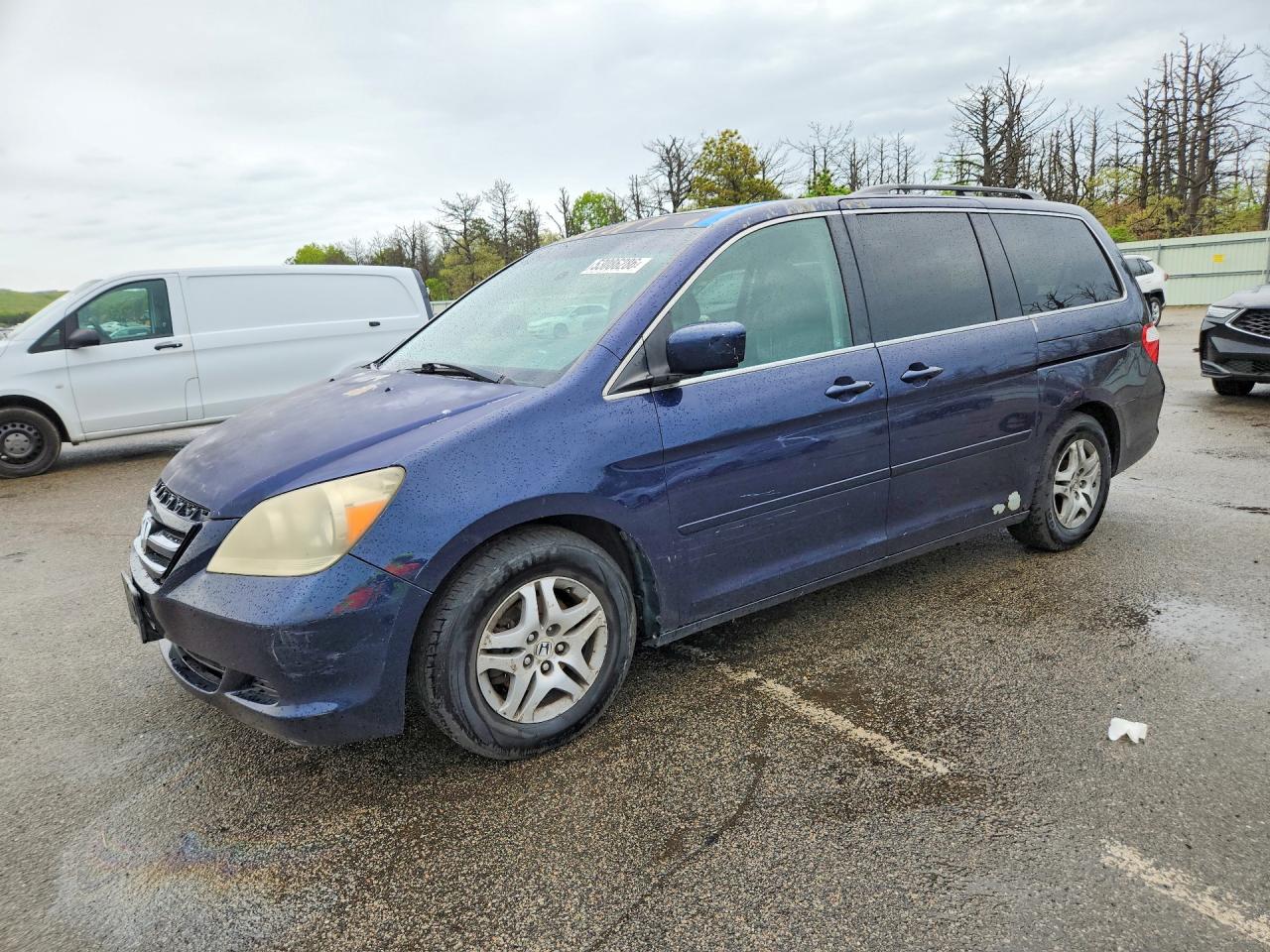 2006 Honda Odyssey EX-L, VIN 5FNRL38706B121946 — Side