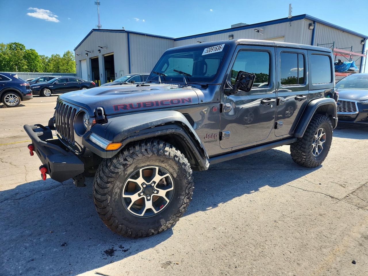 2022 Jeep Wrangler Unlimited Rubicon, VIN 1C4JJXFMXNW258857 — Side