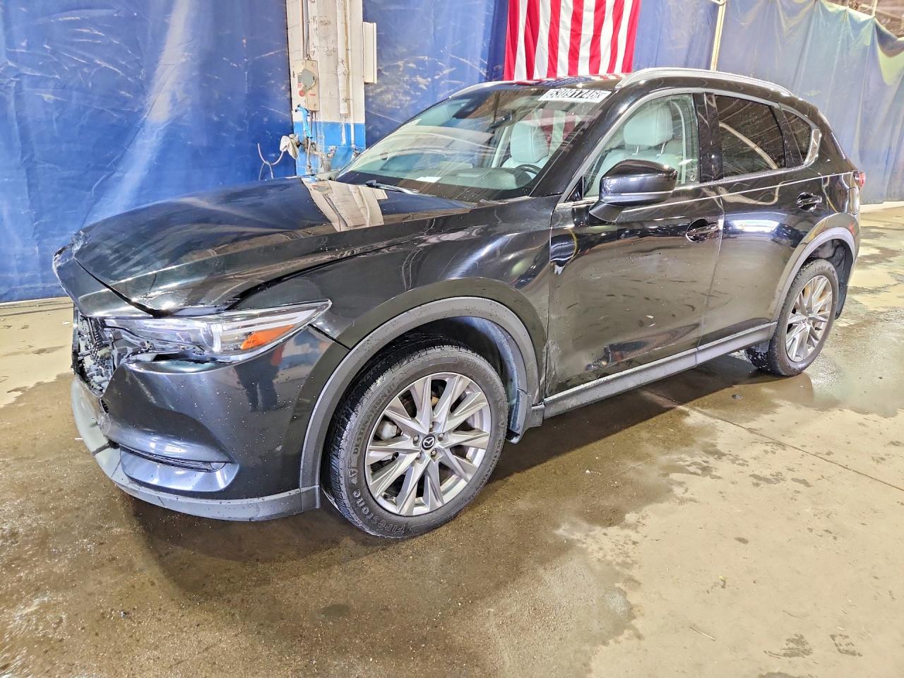 2021 Mazda CX-5 Grand Touring, VIN JM3KFADM8M0359894 — Front end
