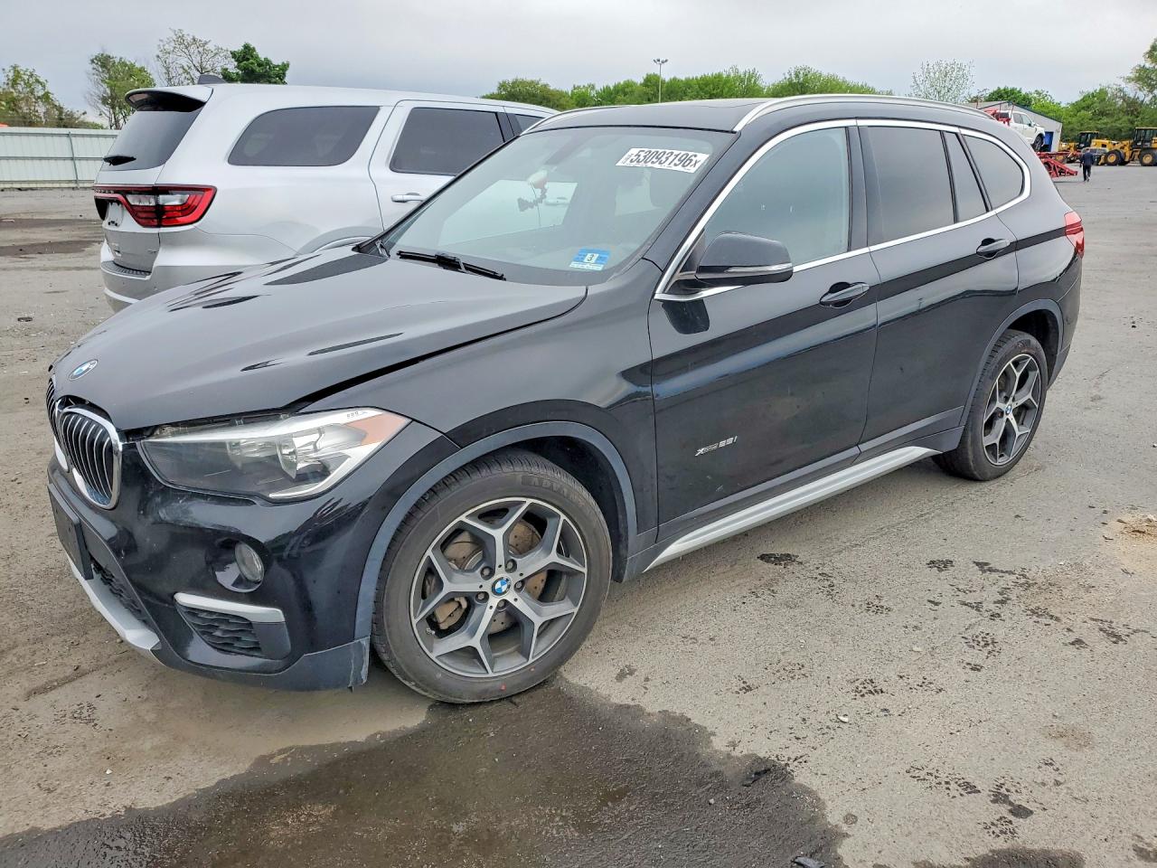 2018 BMW X1 xDrive28i, VIN WBXHT3C39J5K23453 — Engine fire