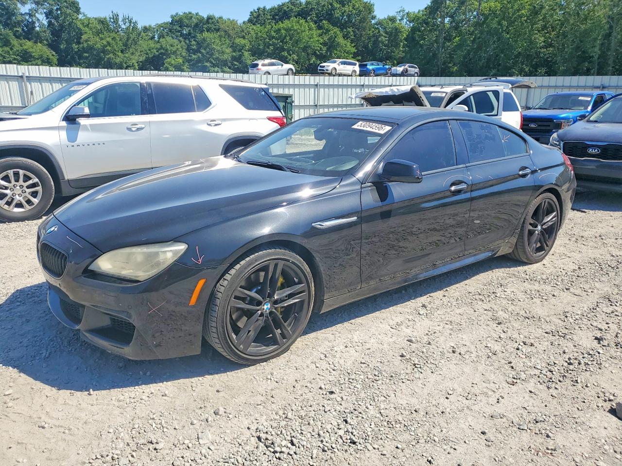 2015 BMW 6 Series 640i, VIN WBA6A0C57FD318999 — Side