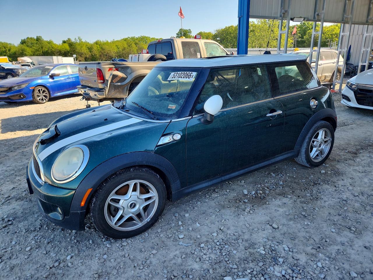 2009 MINI Hardtop S, VIN WMWMF735X9TT97189 — Град