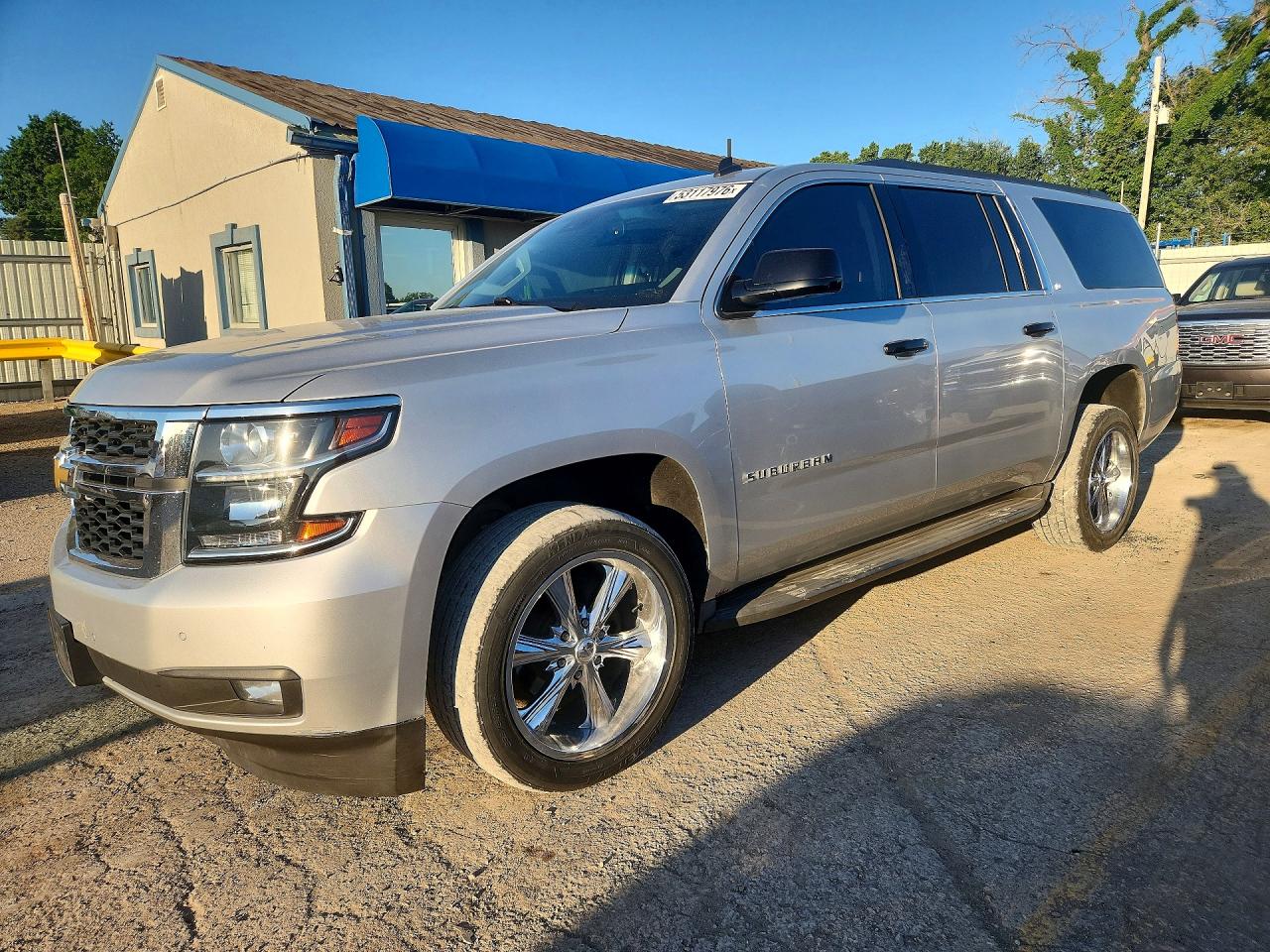 2015 Chevrolet Suburban LT, VIN 1GNSKJKC8FR175057 — Hail