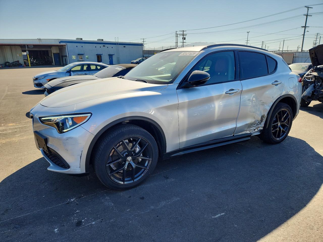 2021 Alfa Romeo Stelvio, VIN ZASPAJAN0M7D09614 — Бок