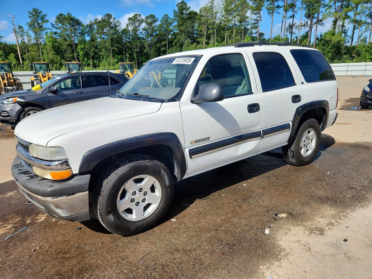 2000 Chevrolet Tahoe LS, VIN 1GNEK13T7YJ149305 — Side