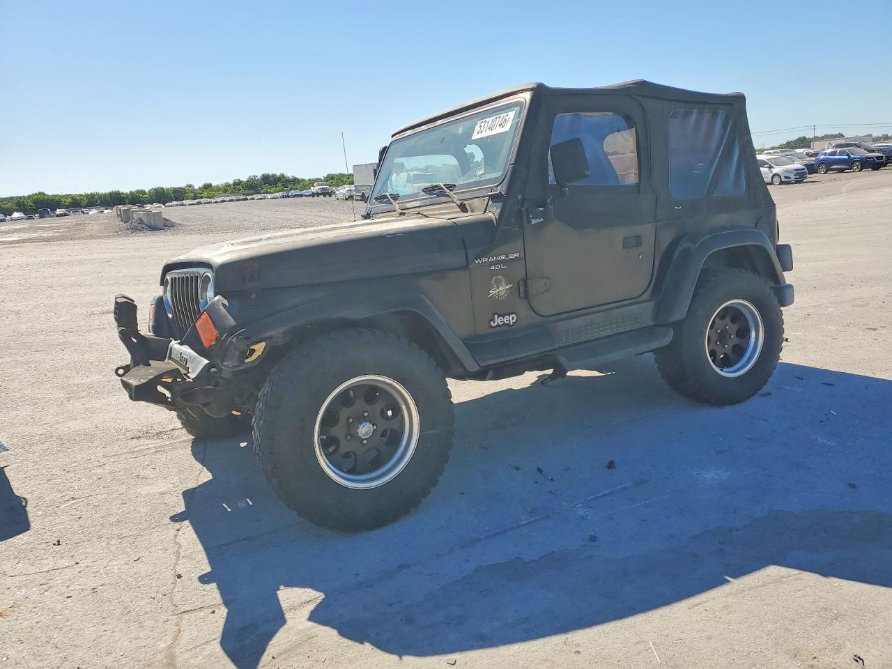 1999 Jeep Wrangler Sahara, VIN 1J4FY49S3XP476365 — Side