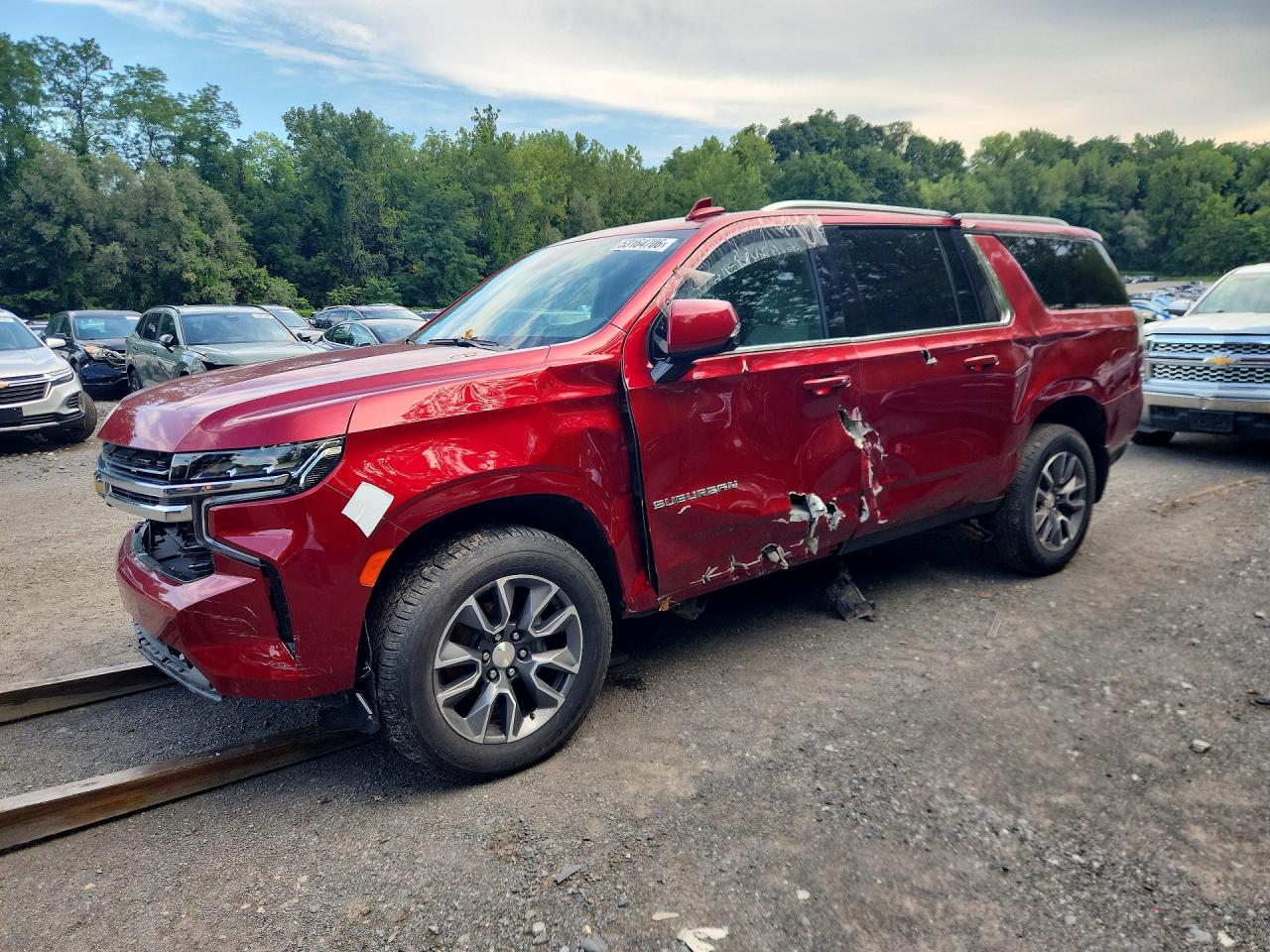 2024 Chevrolet Suburban LT, VIN 1GNSKCKD4RR326016 — Side