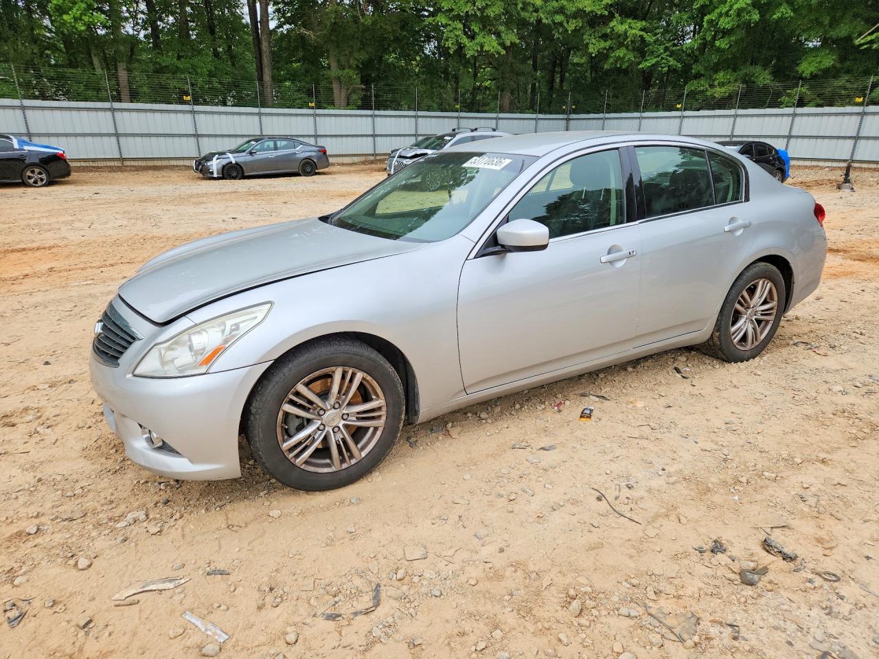 2011 Infiniti G37 Journey, VIN JN1CV6AP4BM506040 — Side