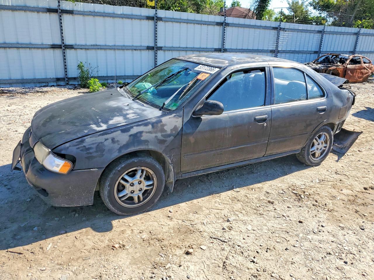 1999 Nissan Sentra XE, VIN 3N1AB41D9XL110035 — Зад