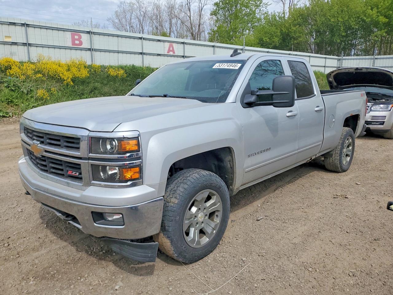 2015 Chevrolet Silverado 1500 LT, VIN 1GCVKREC5FZ408697 — Hail