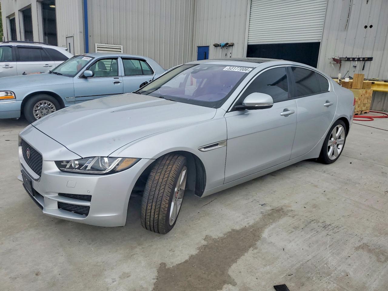2017 Jaguar XE 25t Premium, VIN SAJAD4BG9HA969474 — Side