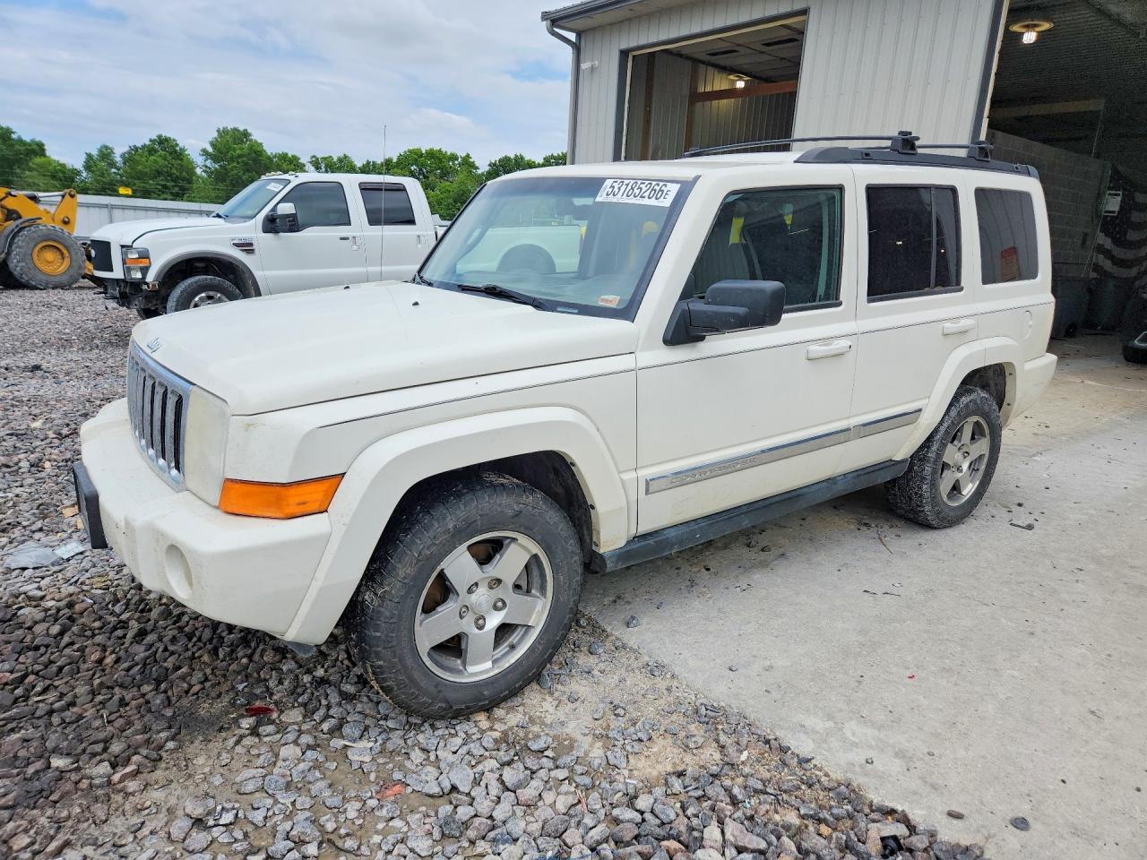 2010 Jeep Commander Sport, VIN 1J4RG4GK9AC125655 — Hail