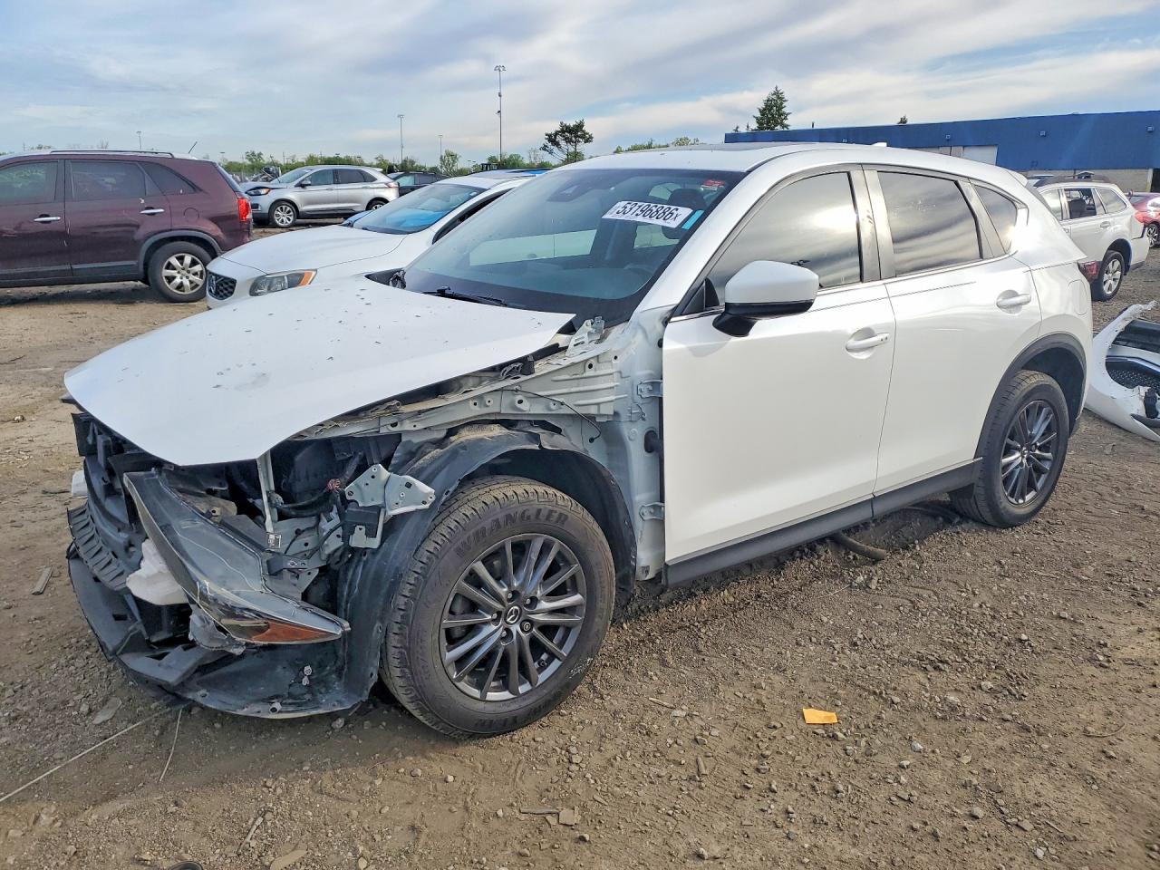 2019 Mazda CX-5 Touring, VIN JM3KFACMXK1588862 — Front end