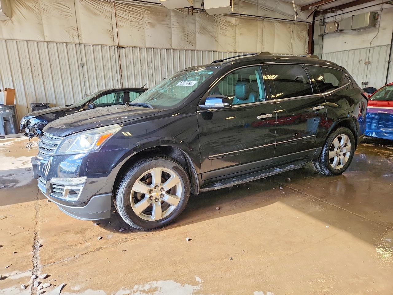 2017 Chevrolet Traverse Premier, VIN 1GNKVJKD4HJ320693 — Hail