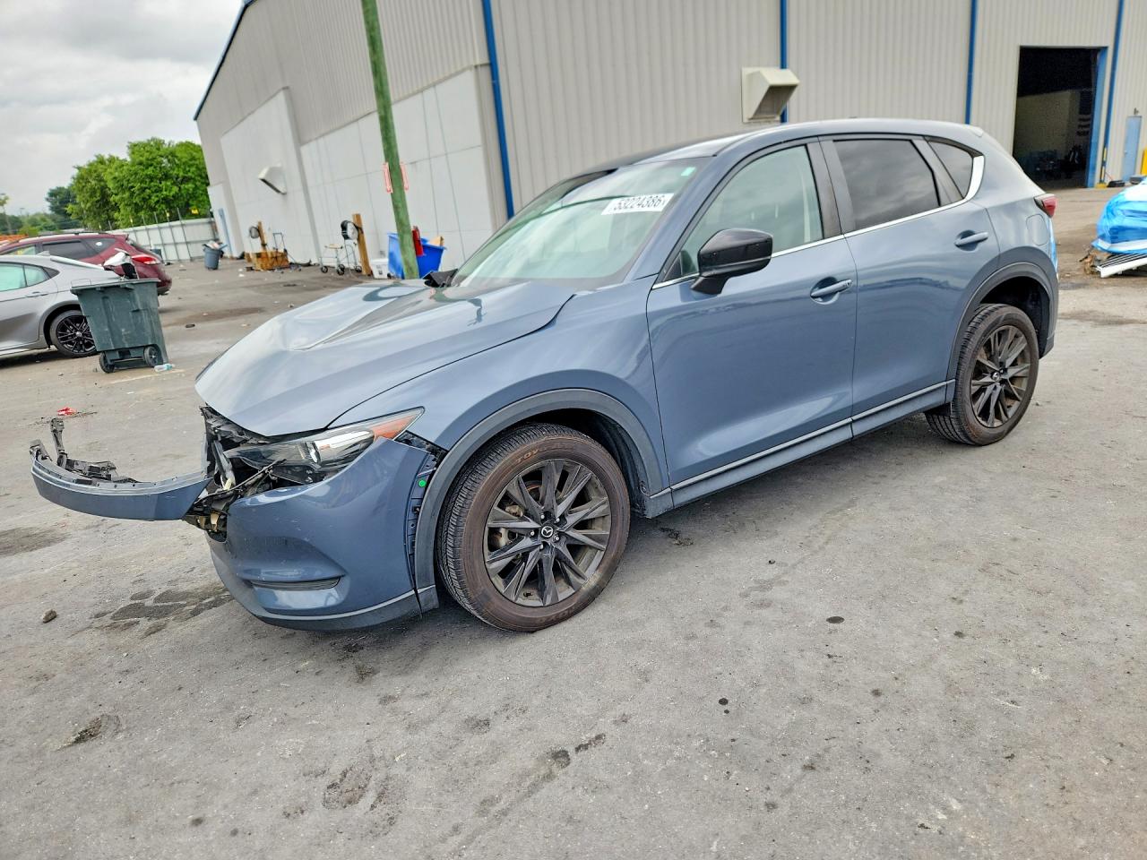 2021 Mazda CX-5 Touring, VIN JM3KFACM7M0345700 — Front end