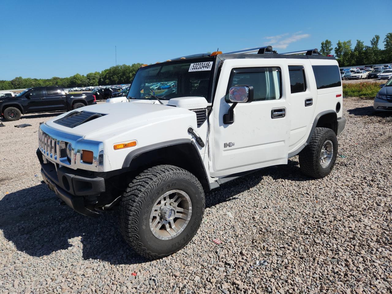 2004 Hummer H2, VIN 5GRGN23U44H122571 — Rear end