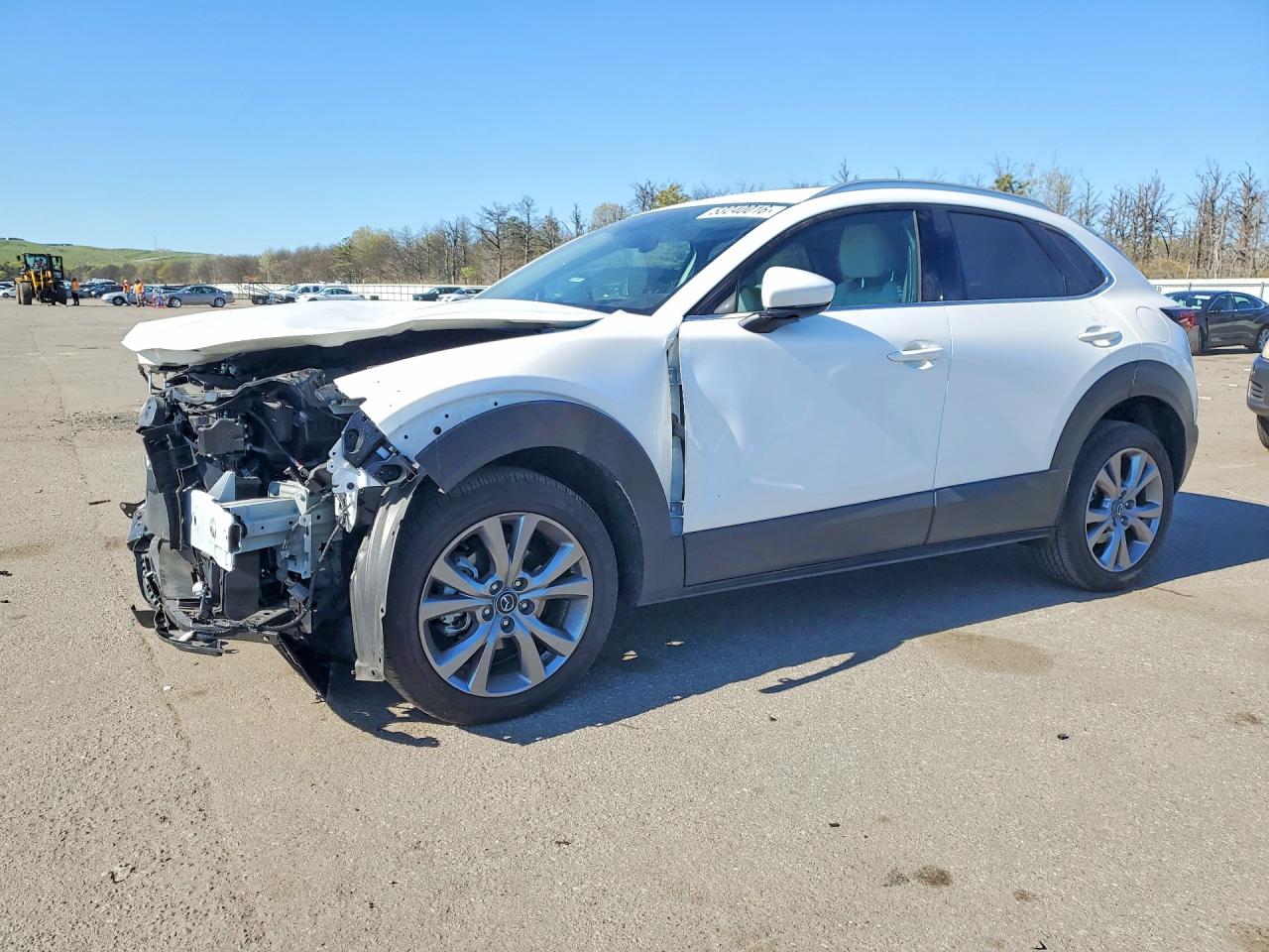 2023 Mazda CX-30 S Premium, VIN 3MVDMBDM9PM588128 — Front end