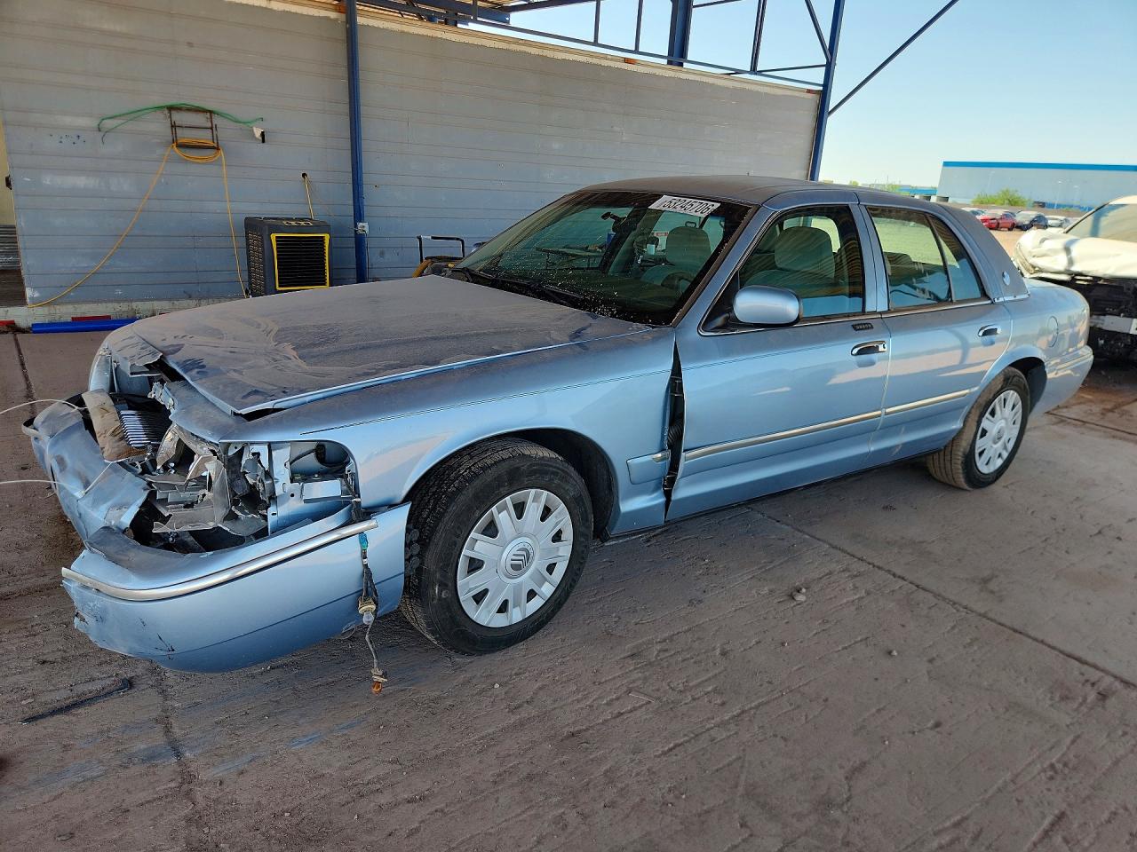 2004 Mercury Grand Marquis GS, VIN 2MEFM74W64X679834 — Front end