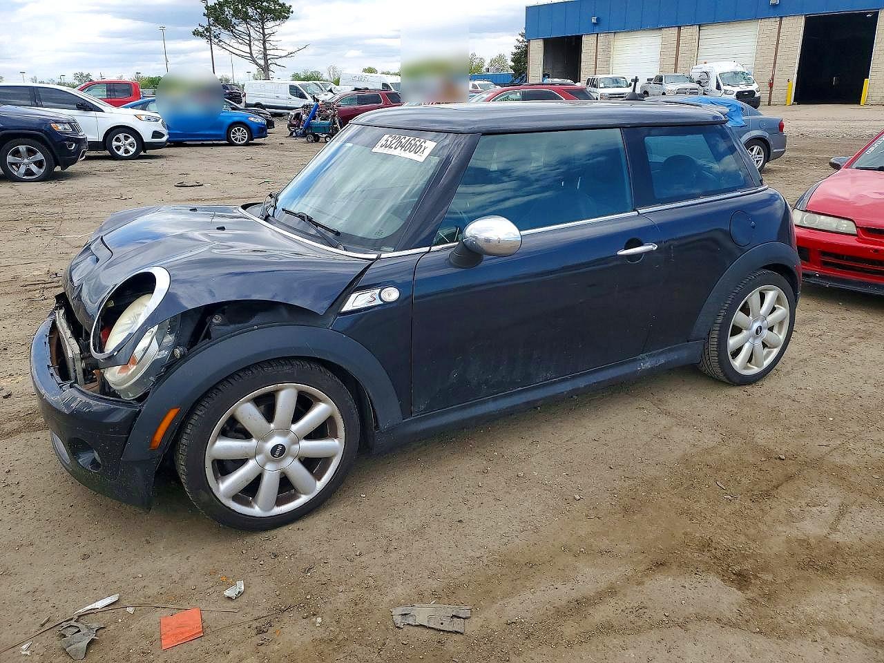 2009 MINI Hardtop S, VIN WMWMF73569TW80155 — Перед