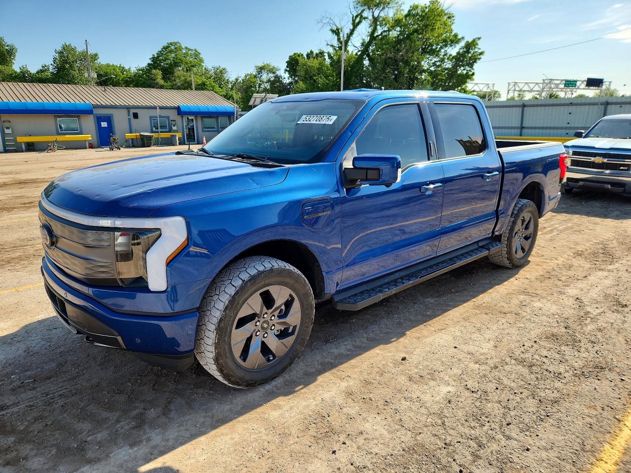 2022 Ford F-150 Lightning Lariat, VIN 1FT6W1EV3NWG00843 — Hail