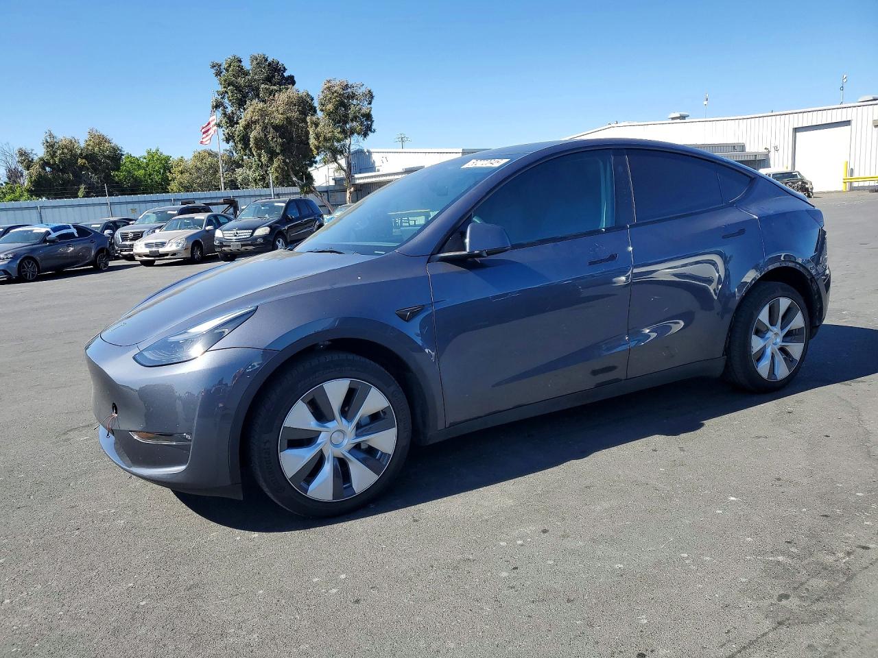 2023 Tesla Model Y Long Range, VIN 7SAYGDEEXPF790710 — Rear end