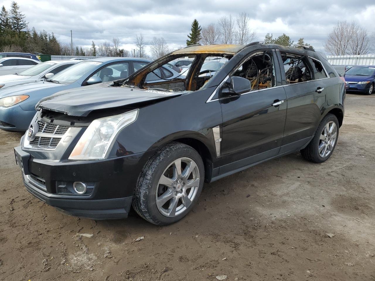 2012 Cadillac SRX Premium Collection, VIN 3GYFNFE31CS625015 — Пожар в салоне