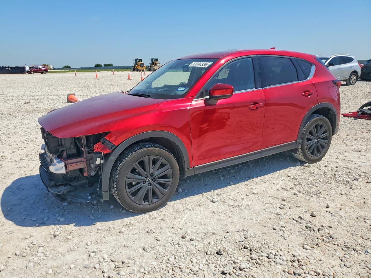 2021 Mazda CX-5 Grand Touring, VIN JM3KFADM3M0408385 — Front end