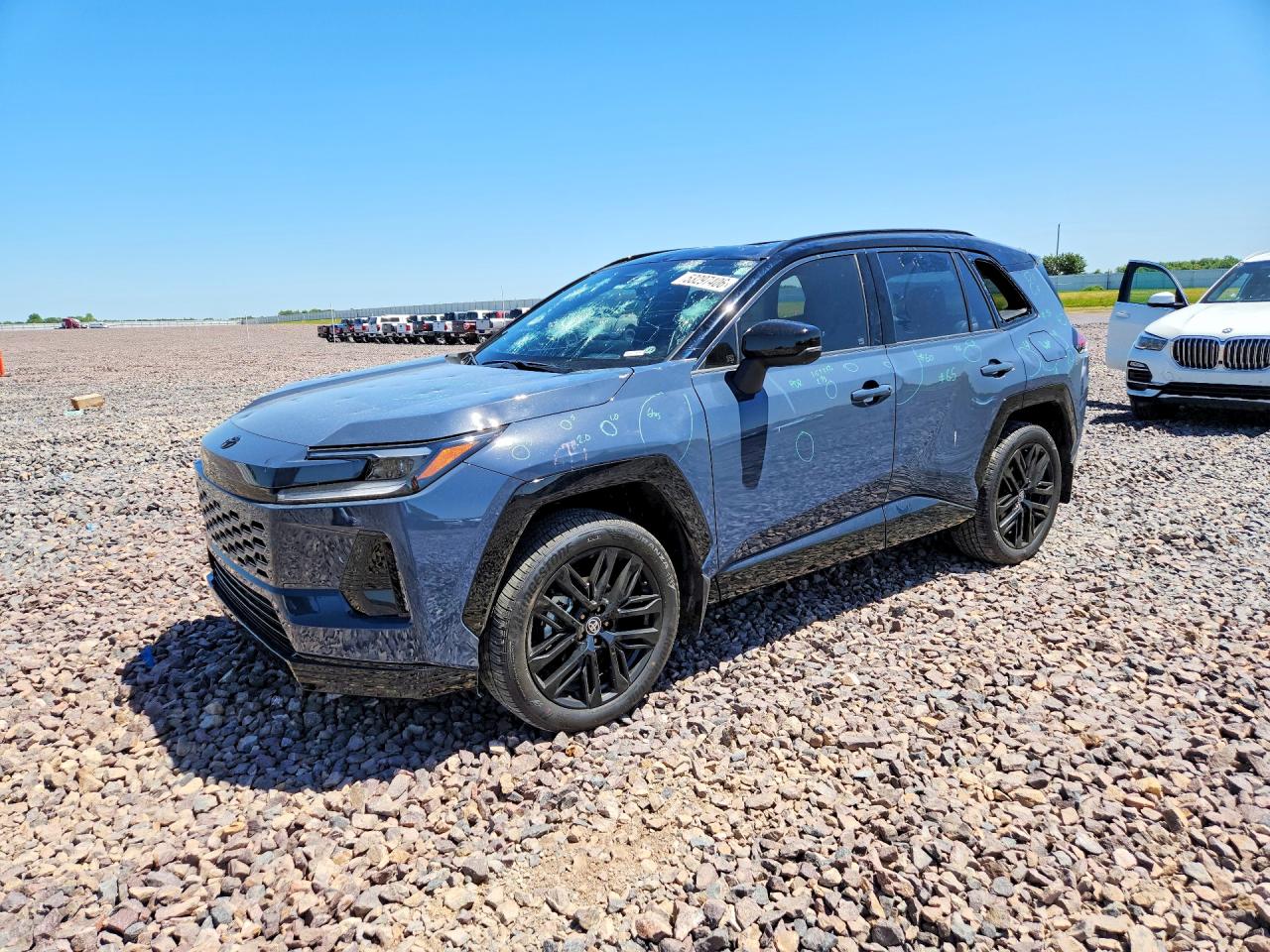 2026 Toyota RAV4 SE, VIN JTM6CRAV2TJ000645 — Град