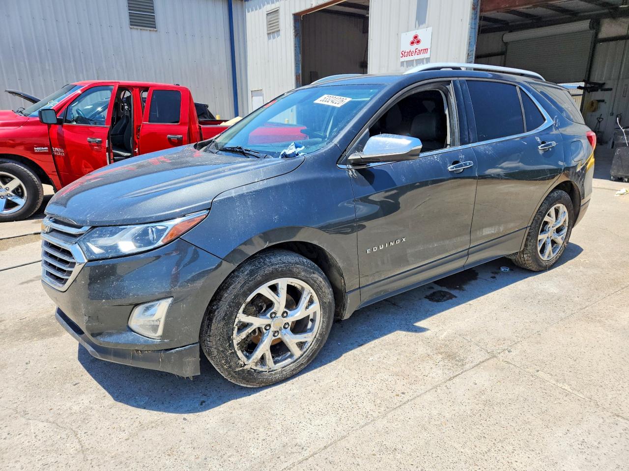 2018 Chevrolet Equinox Premier, VIN 2GNAXMEV9J6205618 — Water / flood