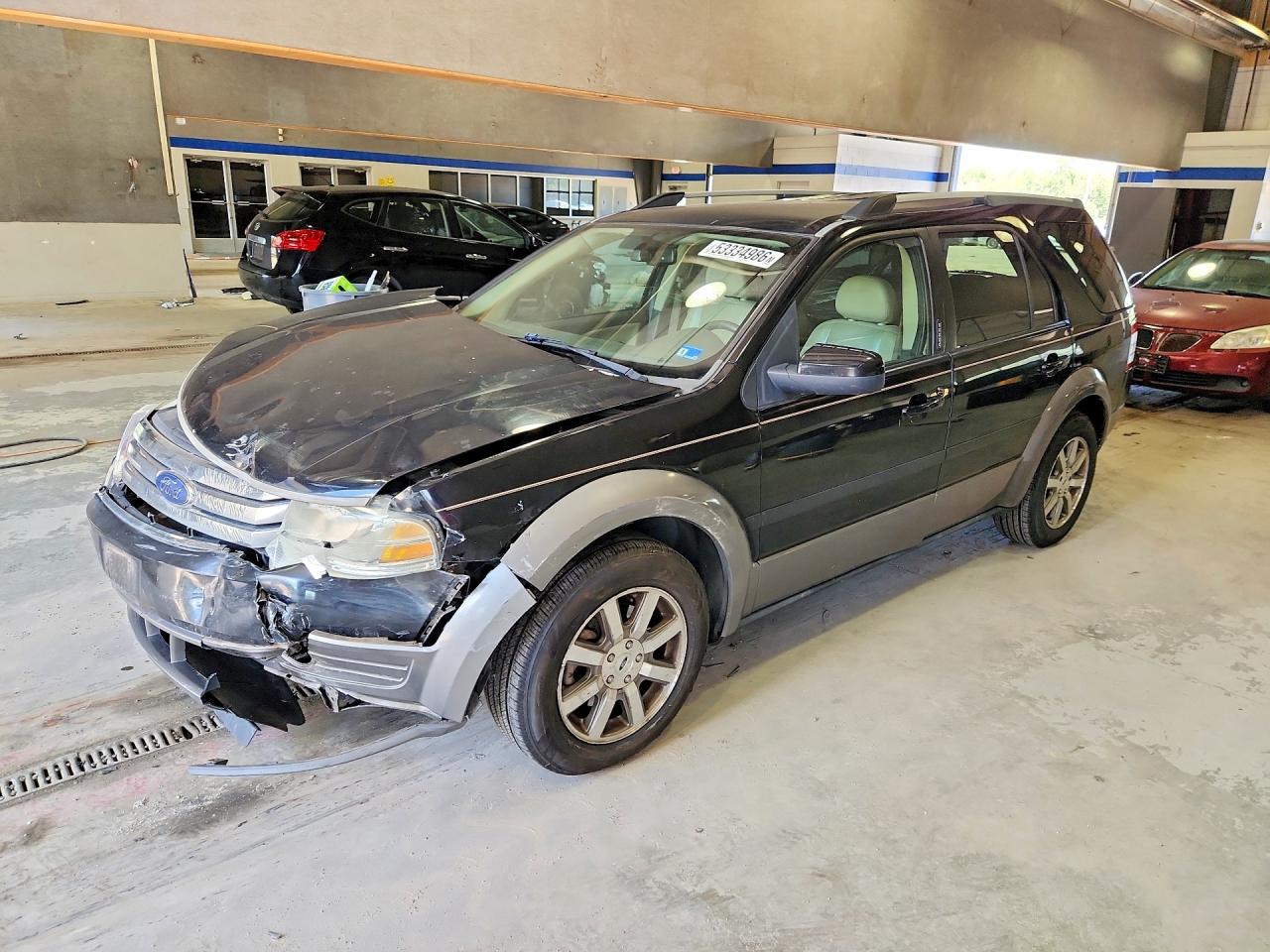 2008 Ford Taurus X SEL, VIN 1FMDK05W48GA23272 — Front end