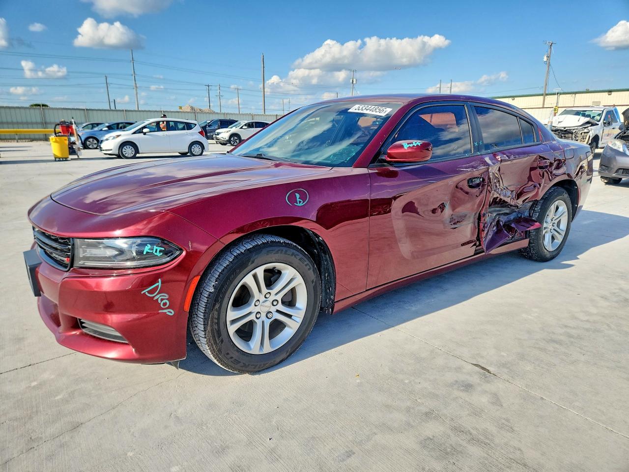 2019 Dodge Charger SXT, VIN 2C3CDXBG0KH673197 — Side
