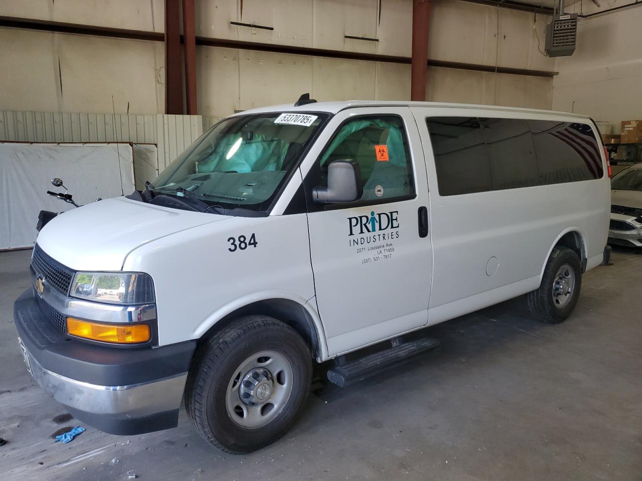 2020 Chevrolet Express Passenger LT, VIN 1GAWGFFP0L1269040 — Side
