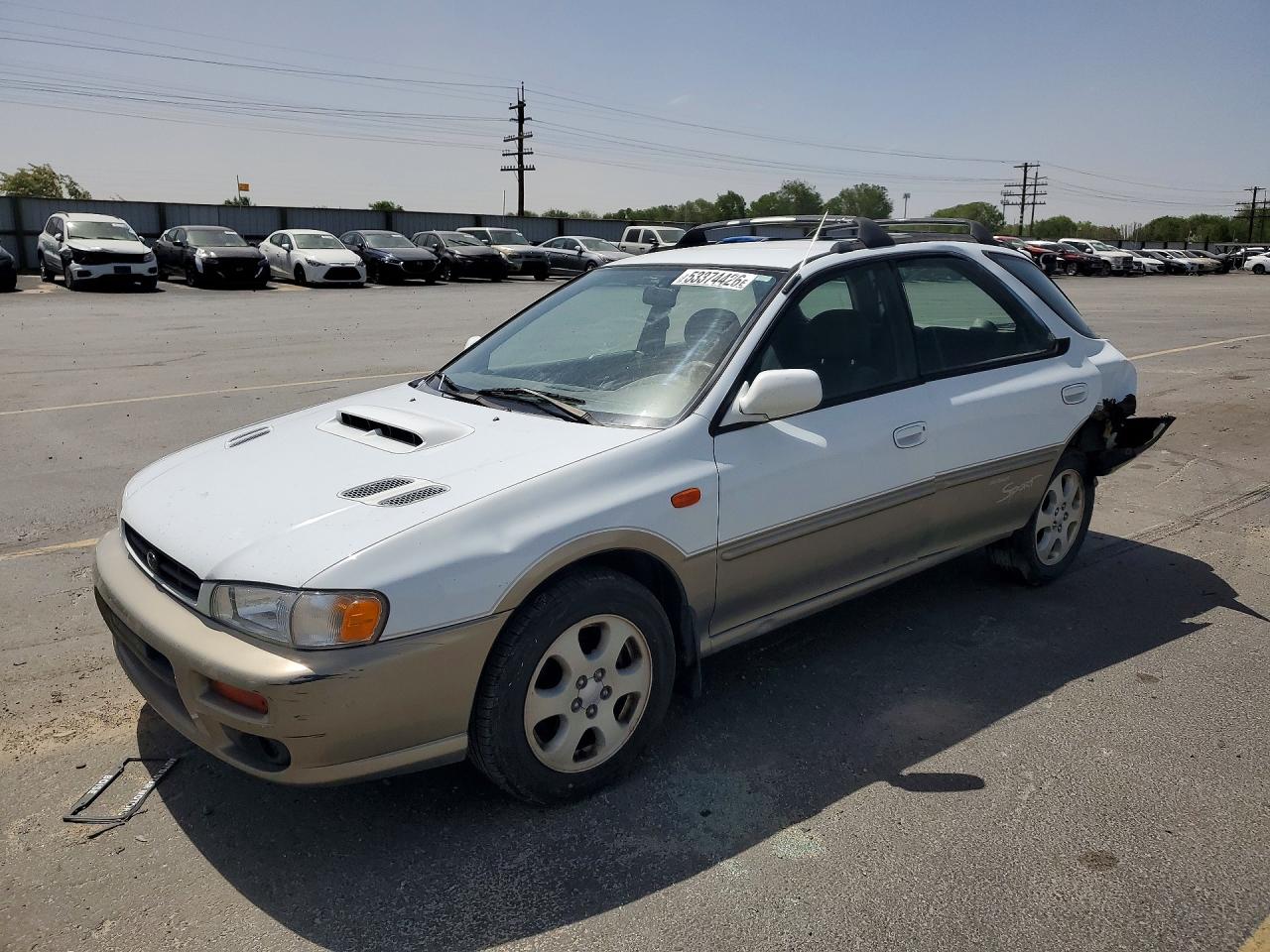 2000 Subaru Impreza Outback Special Sports, VIN JF1GF4857YH801774 — Side