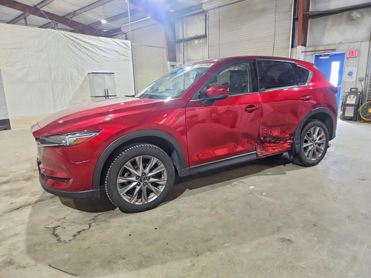 2021 Mazda CX-5 Grand Touring Reserve, VIN JM3KFBAY3M0469782 — Side
