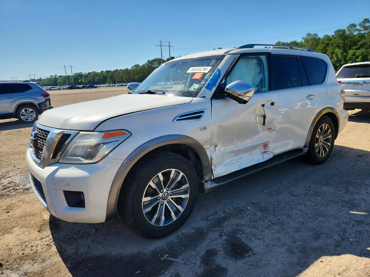 2017 Nissan Armada SL, VIN JN8AY2ND0H9004064 — Side