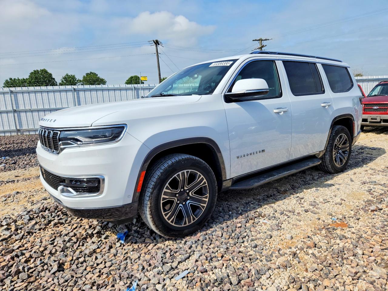 2022 Jeep Wagoneer Series III, VIN 1C4SJVDT1NS182780 — Град