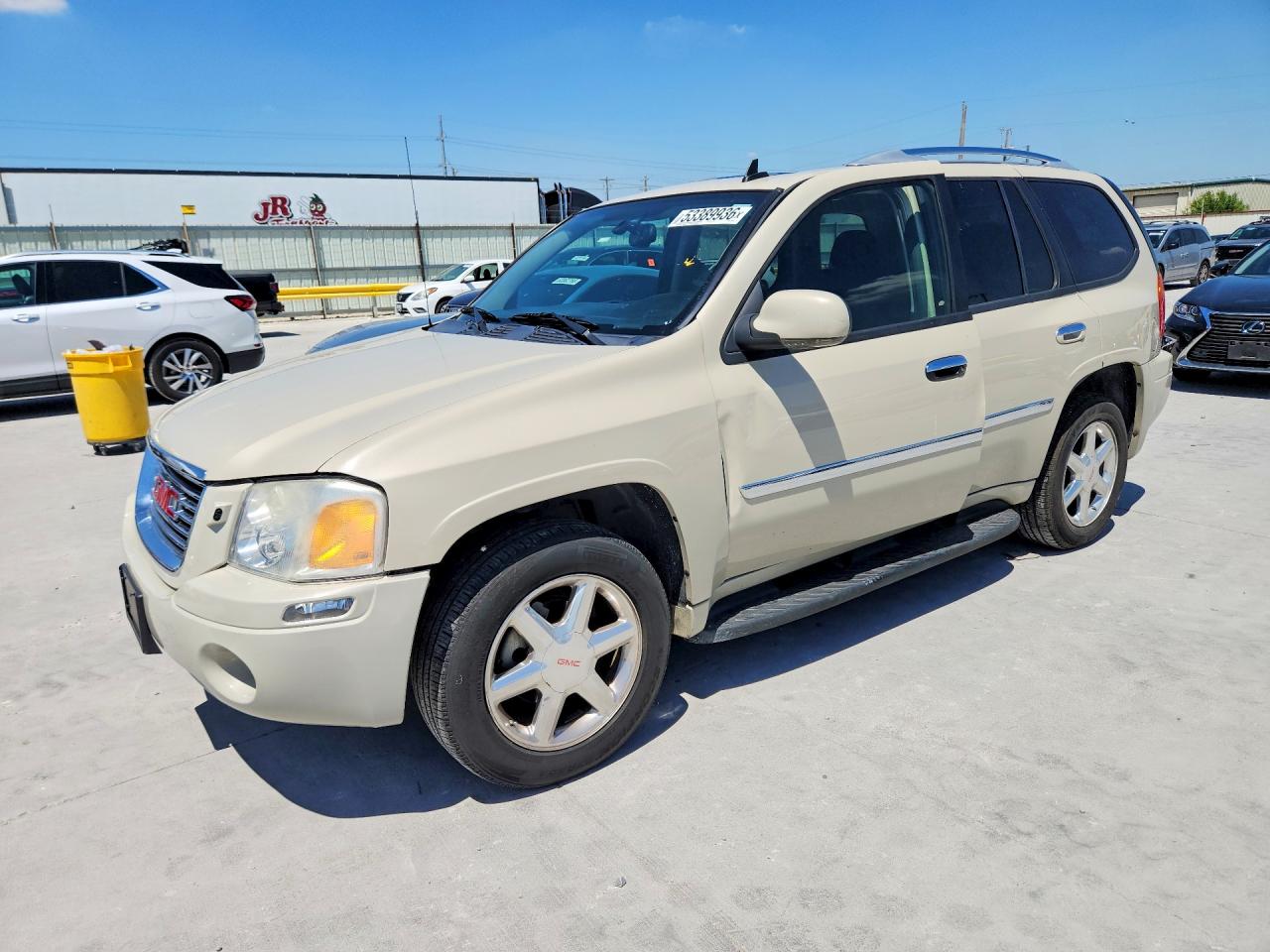 2009 GMC Envoy SLT, VIN 1GKDS43S092126946 — Side
