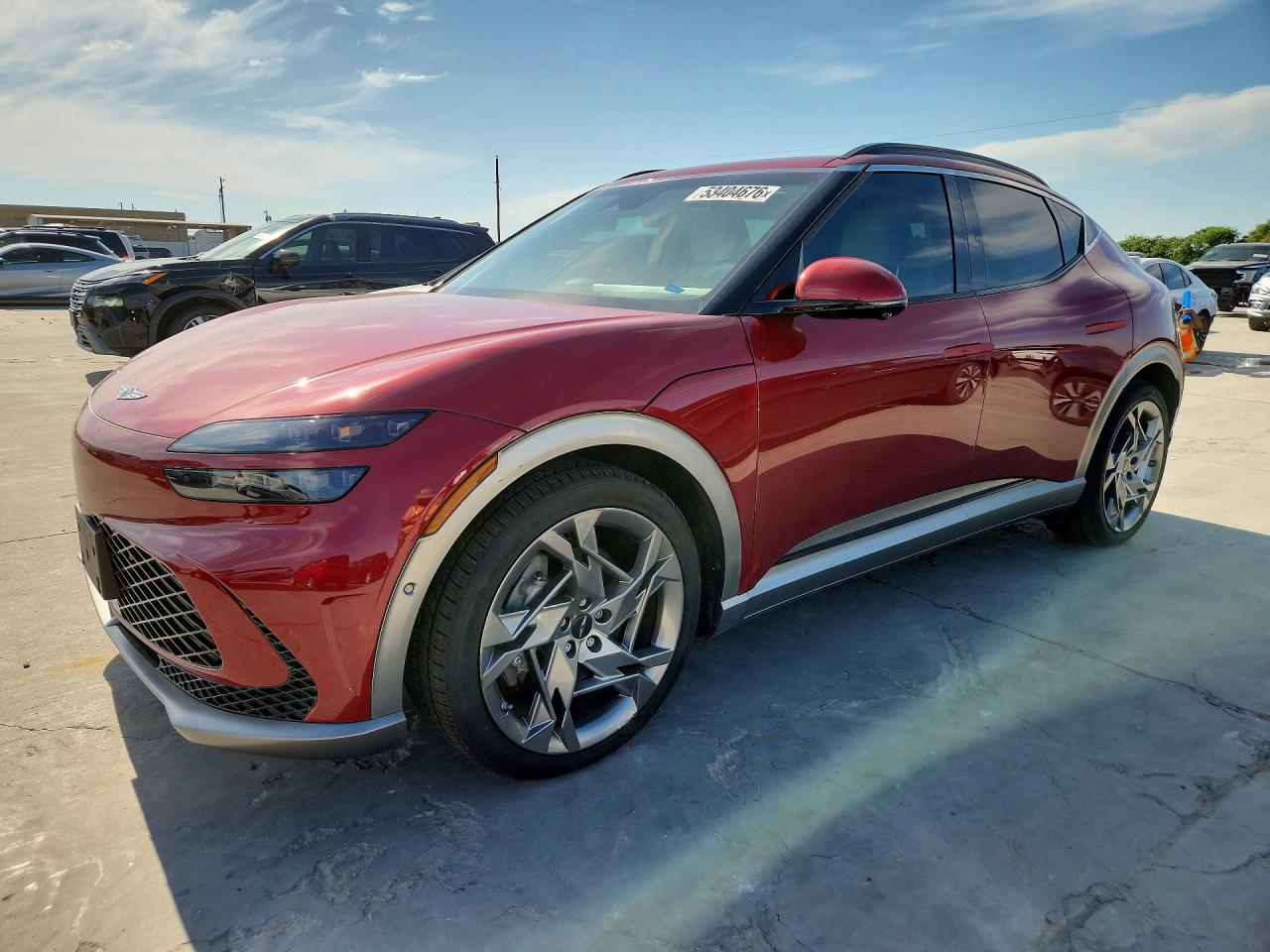 2023 Genesis GV60 Performance, VIN KMUKEDTBXPU015412 — Side