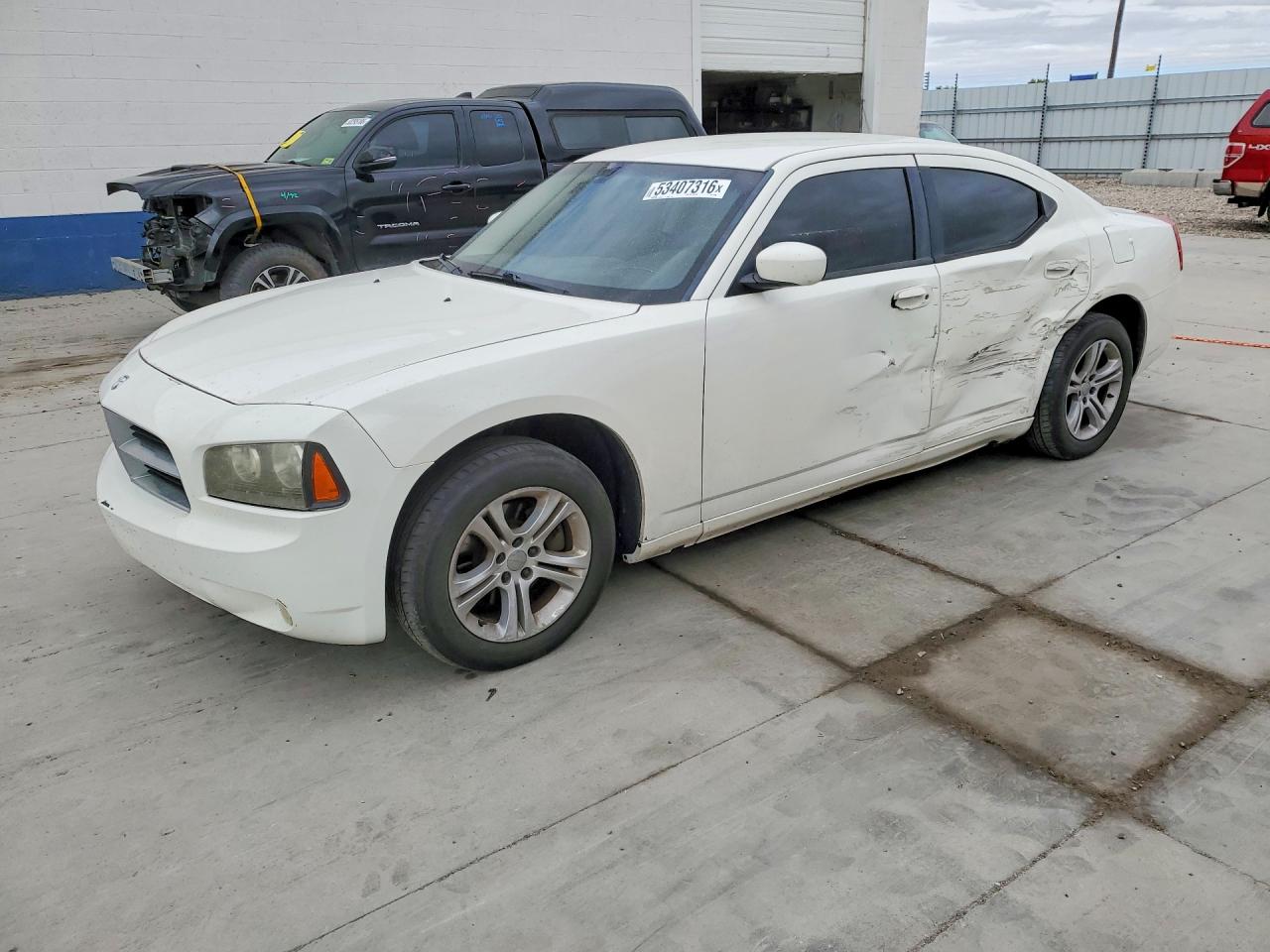 2010 Dodge Charger SXT, VIN 2B3CA3CV1AH116230 — Side